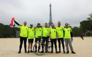 University cyclists reach Paris after 24-hour race for refugees