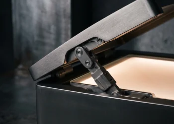 Conceptual close-up of a folding smartphone hinge and glass display.