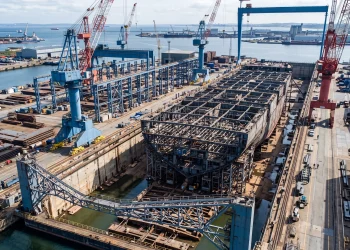 Conceptual view of a modern industrial shipyard and crane infrastructure.