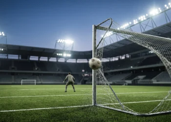 A conceptual view of a football stadium goal area under floodlights.